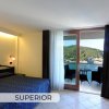 Camera superior con vista mare e balcone.