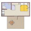 Piantina di una casa mobile con un bagno, cucina, camera matrimoniale e terrazza esterna.